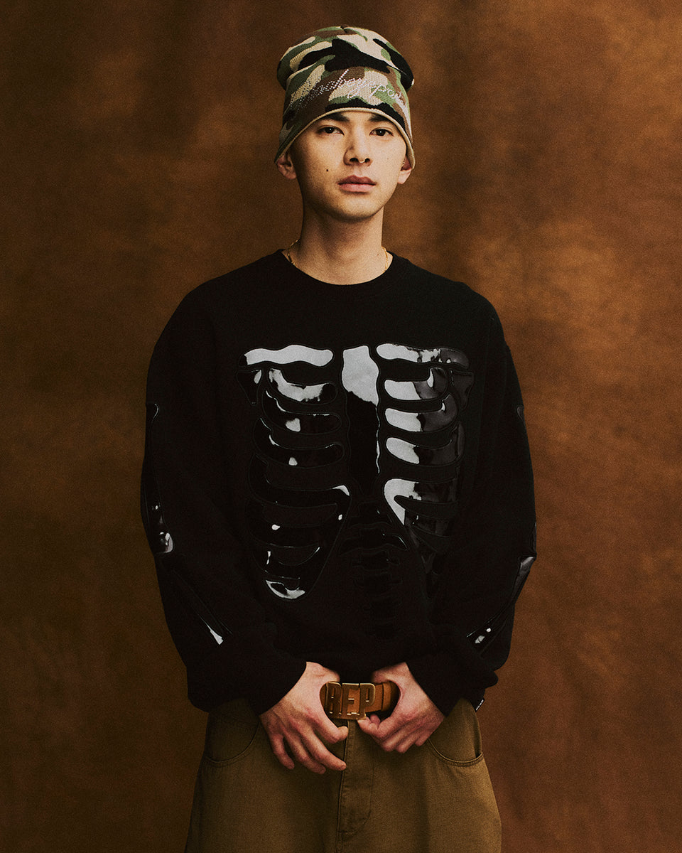 トップス SKELETON PATCHED CREW SWEAT Black Eye Patch SKELETON PATCHED CREW SWEAT ブラックアイパッチの