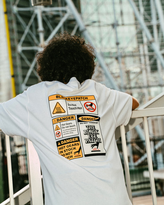 BLACK EYE PATCH × HYBRYDS "DANGER LABEL TEE"