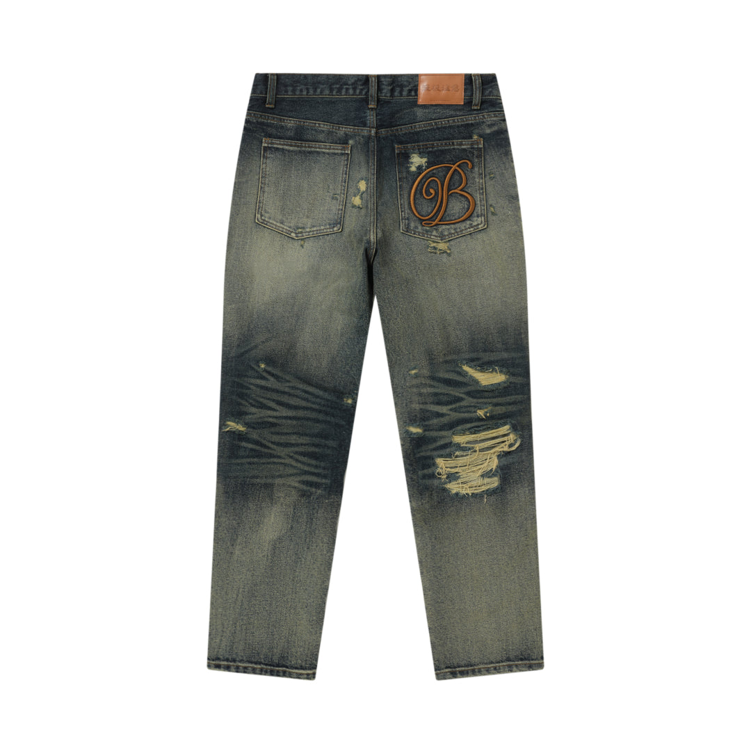 B EMBLEM DAMAGED SLIM JEANS